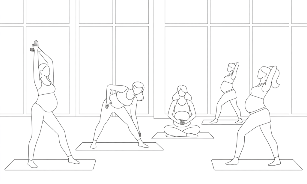 Group of pregnant women doing low-impact aerobics in a fitness studio