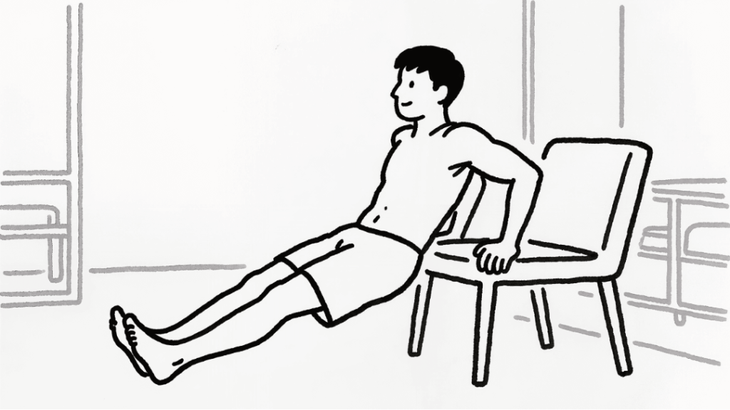 Man doing tricep dips using a sturdy chair in a bright home environment demonstrating proper form.
