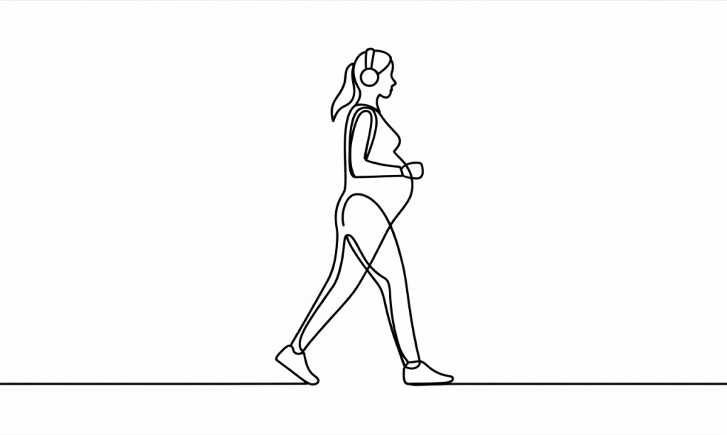 Pregnant woman power walking with headphones in a park.