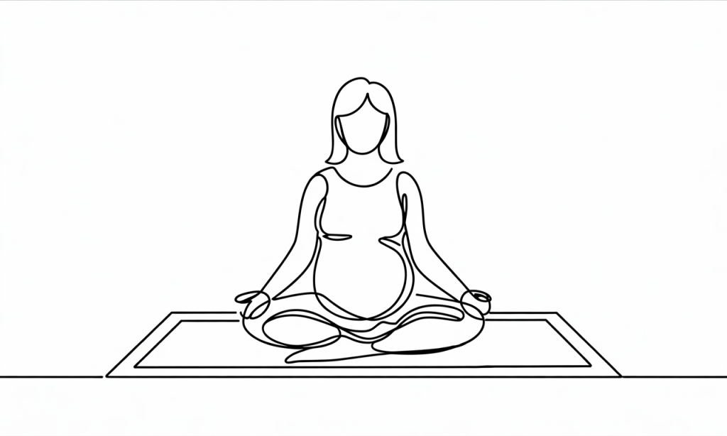 Pregnant woman meditating in a lotus position on a yoga mat.