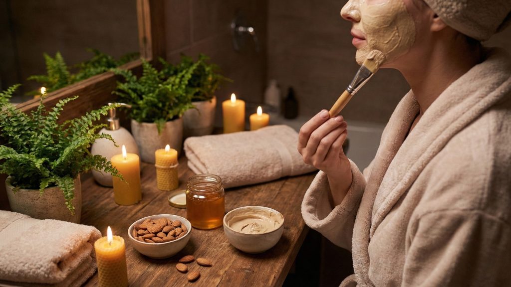 Person demonstrating safe almond benefits application with DIY face mask for natural skin care and radiance.